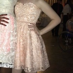Peach colored homecoming dress.